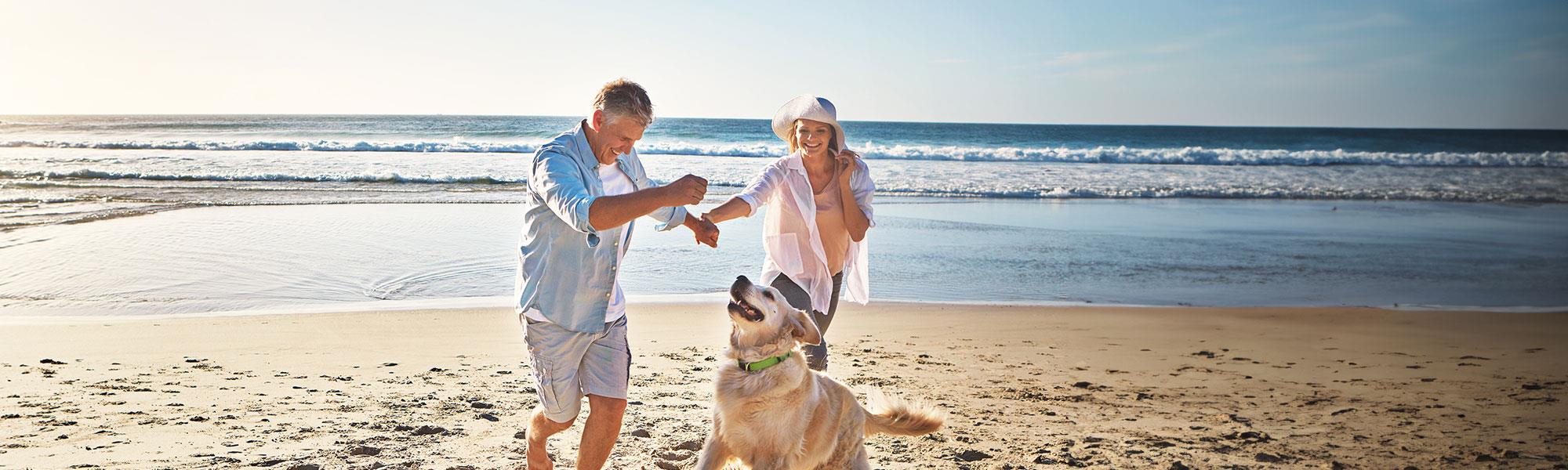 couple on beach in Hervey Bay Sage Estate